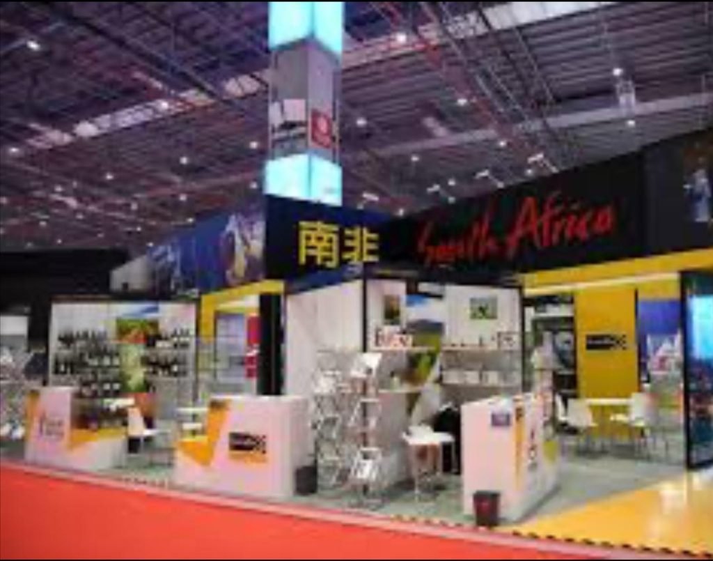 Exhibitors at the South Africa Pavilion showcasing products during previous CIIE