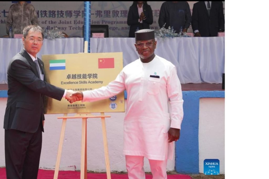 Chinese Ambassador to Sierra Leone Zhao Yong and President Julius Maada Bi0